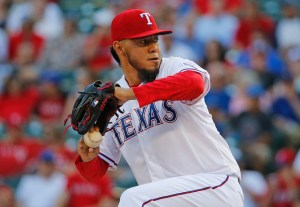 Texas Rangers pitcher Yovani Gallardo throws a first inning pitch during the Los Angeles Dodgers vs. the Texas Rangers major league baseball game at Globe Life Park in Arlington, Texas, on Monday, June 15, 2015. (Louis DeLuca/The Dallas Morning News)