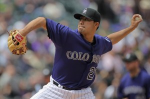 DENVER, CO - APRIL 20: Starting pitcher Jorge De La Rosa #29 of the Colorado Rockies delivers against the San Francisco Giants at Coors Field on April 20, 2011 in Denver, Colorado. (Photo by Doug Pensinger/Getty Images)