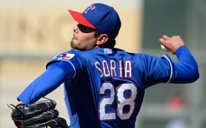 Mar 10, 2014; Surprise, AZ, USA; Texas Rangers pitcher Joakim Soria (28) throws during the seventh inning against the Cincinnati Reds at Surprise Stadium. Mandatory Credit: Christopher Hanewinckel-USA TODAY Sports